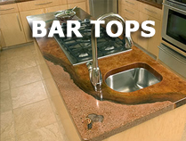 A bar with a sink and a faucet.