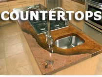 A kitchen with a sink and counter top