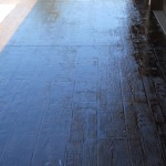 A wooden floor with water on it