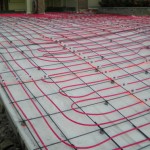 A floor heating system is being installed in the ground.