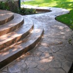 A walkway with steps and a stone path.