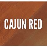 A picture of the words cajun red on top of a wooden floor.