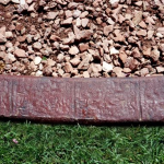 A close up of the edge of a brick