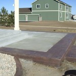 A concrete slab with wood on the bottom.